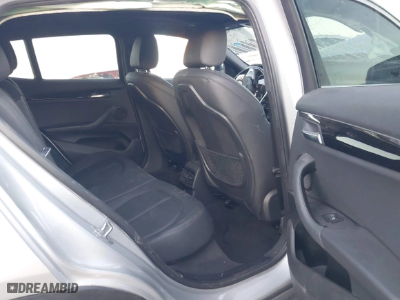 2019 BMW X2 sDrive28i with VIN WBXYJ3C54KEP77217, listed as a IAAI auction lot 41079851 with 100,149 mi miles. Bid and sale history available at carsss.com. Image 8.