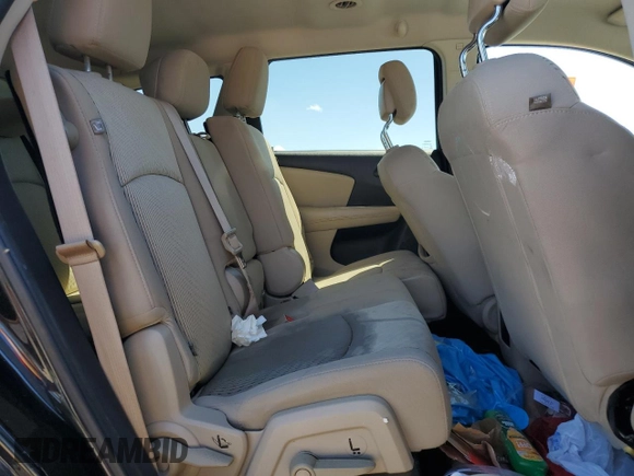 2013 Dodge Journey SE with VIN 3C4PDCAB5DT729415, listed as a Copart auction lot 55851915 with 128,782 mi miles and Salvage title. Bid and sale history available at DreamBid. Image 11.