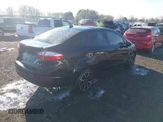 2019 Ford Fiesta SE with VIN 3FADP4BJ3KM117443, listed as a IAAI auction lot 41872511 with 73,981 mi miles. Bid and sale history available at carsss.com. Image 4.