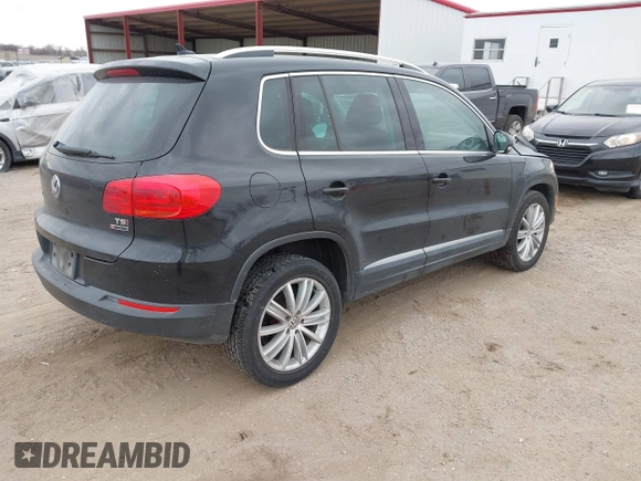 2016 Volkswagen Tiguan S with VIN WVGBV7AX9GW566451, listed as a IAAI auction lot 41393999 with 51,616 mi miles and . Bid and sale history available at DreamBid. Image 4.