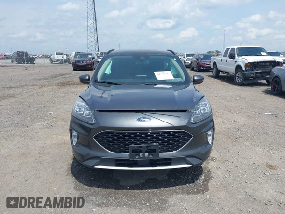 2020 Ford Escape Titanium with VIN 1FMCU9J94LUB19570, listed as a IAAI auction lot 42134031 with 110,248 mi miles and . Bid and sale history available at DreamBid. Image 12.
