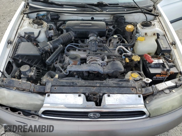1997 Subaru Legacy L with VIN 4S3BK4359V7309059, listed as a Copart auction lot 59600835 with 136,620 mi miles and Salvage title. Bid and sale history available at DreamBid. Image 11.