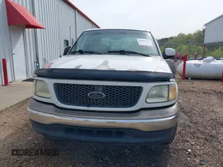 2001 Ford F-150 XLT with VIN 1FTRW07641KC51870, listed as a IAAI auction lot 41879102 with 202,967 mi miles and . Bid and sale history available at DreamBid. Image 6.