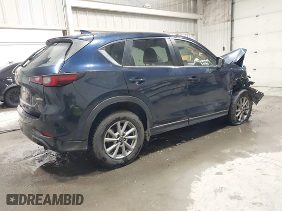 2023 Mazda CX-5 2.5 S Carbon Edition with VIN JM3KFBCM0P0173021, listed as a IAAI auction lot 41262695 with 42,186 mi miles. Bid and sale history available at carsss.com. Image 4.