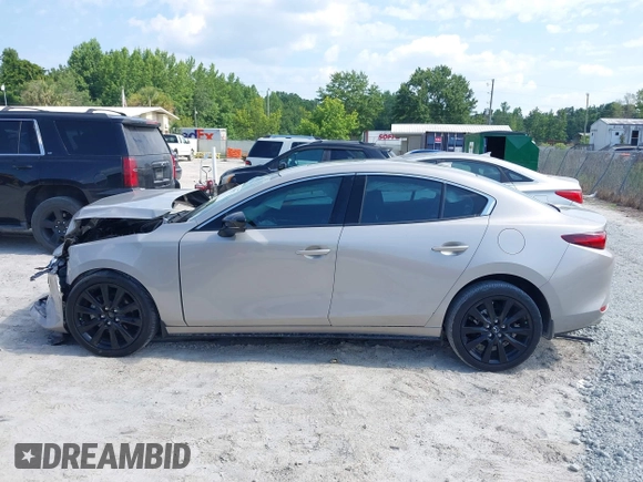 2022 Mazda 3 2.5 Turbo with VIN 3MZBPBAY8NM300598, listed as a IAAI auction lot 42569553 with 27,736 mi miles and . Bid and sale history available at DreamBid. Image 14.
