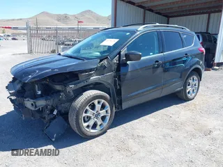 2014 Ford Escape SE z VIN 1FMCU9G97EUB64559, wystawiony jako IAAI lot #42238726 z przebiegiem 124 633 mil mil oraz . Historia ofert i sprzedaży dostępna na DreamBid. Obrazek 2.