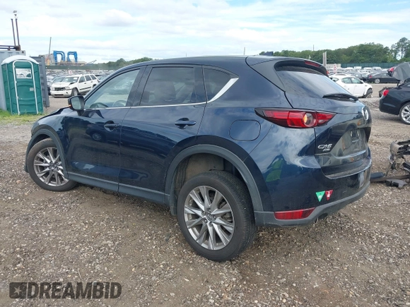 2019 Mazda CX-5 Grand Touring with VIN JM3KFBDM8K1521231, listed as a IAAI auction lot 42738963 with 32,179 mi miles and . Bid and sale history available at DreamBid. Image 3.