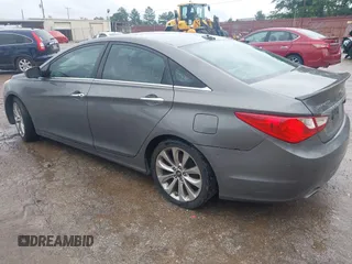 2012 Hyundai Sonata SE z VIN 5NPEC4AC7CH435022, wystawiony jako IAAI lot #42491555 z przebiegiem 176 670 mil mil oraz . Historia ofert i sprzedaży dostępna na DreamBid. Obrazek 3.