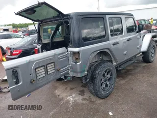 2018 Jeep Wrangler Unlimited Rubicon with VIN 1C4HJXFG4JW174603, listed as a IAAI auction lot 42202302 with 120,229 mi miles and . Bid and sale history available at DreamBid. Image 4.