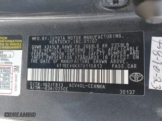 2007 Toyota Camry CE with VIN 4T1BE46KX7U115813, listed as a IAAI auction lot 41803314 with 165,233 mi miles. Bid and sale history available at carsss.com. Image 9.
