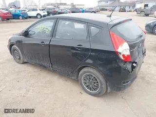 2014 Hyundai Accent GS with VIN KMHCT5AE6EU197814, listed as a IAAI auction lot 41697539 with 228,490 mi miles. Bid and sale history available at carsss.com. Image 3.