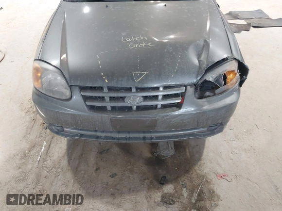 2004 Hyundai Accent GL with VIN KMHCG45C44U528783, listed as a IAAI auction lot 41535104 with 1 mi miles. Bid and sale history available at carsss.com. Image 12.