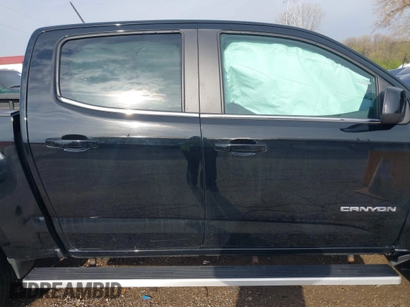 2019 GMC Canyon 4WD SLE z VIN 1GTG6CEN2K1354585, wystawiony jako IAAI lot #42014158 z przebiegiem 34 269 mil mil oraz . Historia ofert i sprzedaży dostępna na DreamBid. Obrazek 13.