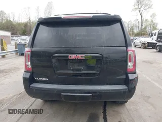 2017 GMC Yukon SLT with VIN 1GKS1BKC2HR128308, listed as a IAAI auction lot 41945770 with 158,905 mi miles. Bid and sale history available at carsss.com. Image 16.