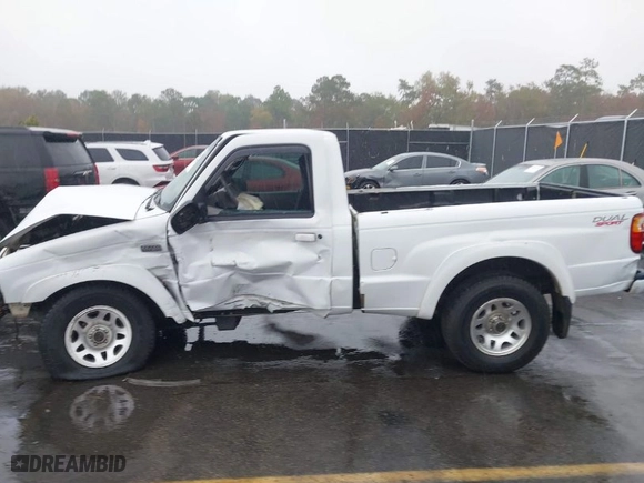 2002 Mazda B-Series 2WD Truck DS with VIN 4F4YR12U82TM11900, listed as a IAAI auction lot 40773356 with 118,353 mi miles. Bid and sale history available at carsss.com. Image 14.