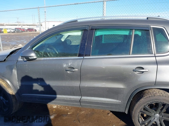 2016 Volkswagen Tiguan S with VIN WVGBV7AX9GW616488, listed as a IAAI auction lot 41402119 with 66,288 mi miles and . Bid and sale history available at DreamBid. Image 14.