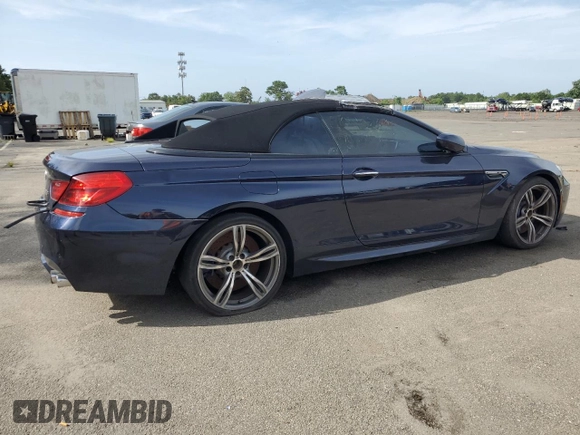 2015 BMW M6 with VIN WBSLZ9C59FD651474, listed as a Copart auction lot 60882454 with Not provided miles and Salvage title. Bid and sale history available at DreamBid. Image 3.