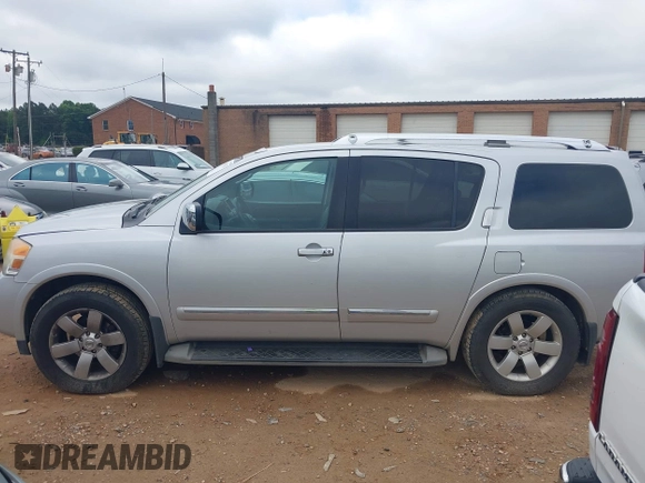 2014 Nissan Armada Platinum z VIN 5N1BA0ND5EN609740, wystawiony jako IAAI lot #42308325 z przebiegiem 197 675 mil mil oraz . Historia ofert i sprzedaży dostępna na DreamBid. Obrazek 13.