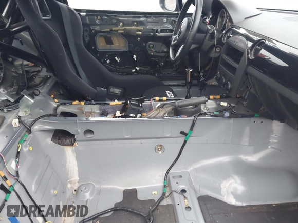 2006 Mazda MX-5 Miata Grand Touring with VIN JM1NC25F760103866, listed as a IAAI auction lot 40879777 with 50,209 mi miles and . Bid and sale history available at DreamBid. Image 5.