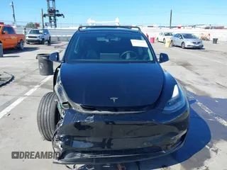 2021 Tesla Model Y Performance with VIN 5YJYGDEF9MF251738, listed as a IAAI auction lot 41708950 with 61,248 mi miles and . Bid and sale history available at DreamBid. Image 13.