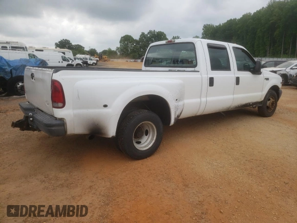 1999 Ford F-350 XL with VIN 1FTWW32FXXEB79284, listed as a Copart auction lot 53969905 with 241,082 mi miles and Salvage title. Bid and sale history available at DreamBid. Image 3.