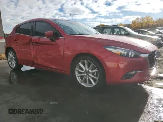 2017 Mazda 3 Grand Touring with VIN JM1BN1M37H1126947, listed as a Copart auction lot 77704214 with 70,970 mi miles and Salvage Title. Bid and sale history available at DreamBid. Image 4.