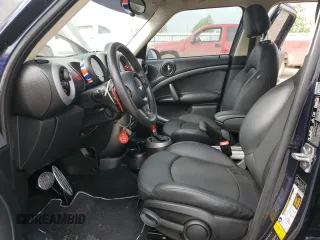 2012 MINI Countryman S z VIN WMWZC5C50CWL59205, wystawiony jako Copart lot #51659675 z przebiegiem 43 264 mil mil oraz Szkoda całkowita • Salvage title. Historia ofert i sprzedaży dostępna na DreamBid. Obrazek 7.