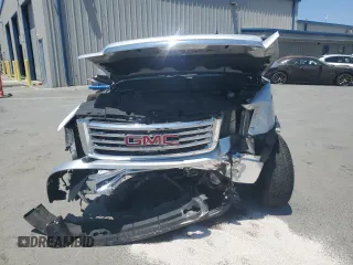 2013 GMC Sierra 1500 SLT with VIN 3GTP2WE71DG157541, listed as a Copart auction lot 62363665 with 56,143 mi miles and Salvage title. Bid and sale history available at DreamBid. Image 5.