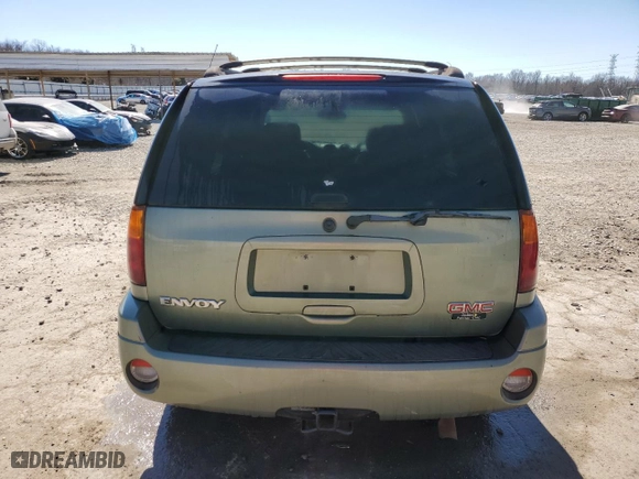 2003 GMC Envoy SLT with VIN 1GKDS13S932203853, listed as a Copart auction lot 46364585 with 130,681 mi miles and Salvage Title. Bid and sale history available at carsss.com. Image 6.
