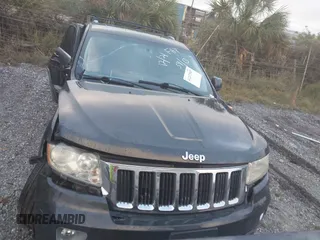 2011 Jeep Grand Cherokee Laredo z VIN 1J4RR4GG2BC737140, wystawiony jako IAAI lot #41217587 z przebiegiem Nie podano mil oraz . Historia ofert i sprzedaży dostępna na DreamBid. Obrazek 12.