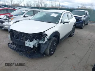 2023 Mazda CX-30 S z VIN 3MVDMBAM6PM572425, wystawiony jako IAAI lot #41833170 z przebiegiem 18 307 mil mil oraz . Historia ofert i sprzedaży dostępna na DreamBid. Obrazek 18.