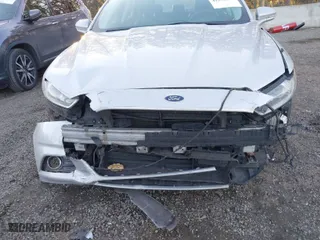 2015 Ford Fusion Energi Titanium with VIN 3FA6P0SU8FR264846, listed as a IAAI auction lot 41552443 with 160,142 mi miles. Bid and sale history available at carsss.com. Image 6.