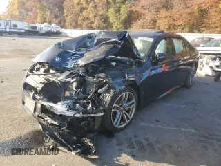 2018 BMW 7 Series 740i xDrive with VIN WBA7E4C53JGV23968, listed as a Copart auction lot 77244814 with 0 mi miles and Salvage Title. Bid and sale history available at carsss.com. Image 1.