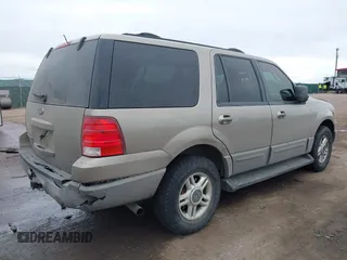 2003 Ford Expedition XLT Value z VIN 1FMPU16W83LA24310, wystawiony jako IAAI lot #41655746 z przebiegiem 201 482 mil mil oraz . Historia ofert i sprzedaży dostępna na DreamBid. Obrazek 4.