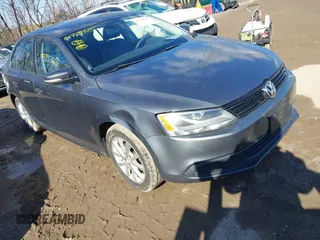 2012 Volkswagen Jetta SE z VIN 3VWDX7AJ7CM307516, wystawiony jako IAAI lot #41729725 z przebiegiem 165 977 mil mil oraz . Historia ofert i sprzedaży dostępna na DreamBid. Obrazek 1.