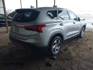 2021 Hyundai Santa Fe SE with VIN 5NMS14AJ4MH330556, listed as a IAAI auction lot 41297743 with 101,156 mi miles. Bid and sale history available at carsss.com. Image 4.