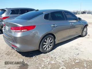 2016 Kia Optima EX with VIN 5XXGU4L31GG106854, listed as a IAAI auction lot 41762052 with 122,121 mi miles. Bid and sale history available at carsss.com. Image 4.