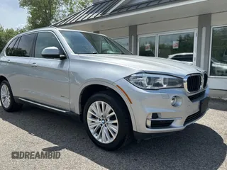 2016 BMW X5 xDrive40e z VIN 5UXKT0C52G0F74828, wystawiony jako Copart lot #58977975 z przebiegiem 122 045 mil mil oraz Tytuł czysty. Historia ofert i sprzedaży dostępna na DreamBid. Obrazek 1.