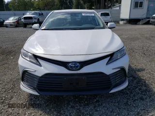 2021 Toyota Camry Hybrid LE with VIN 4T1C31AK0MU563909, listed as a Copart auction lot 55063965 with 26,802 mi miles and Salvage Title. Bid and sale history available at carsss.com. Image 5.