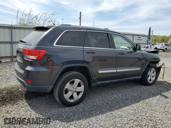 2011 Jeep Grand Cherokee Laredo z VIN 1J4RR4GG8BC738468, wystawiony jako Copart lot #54907215 z przebiegiem 182 576 mil mil oraz Szkoda całkowita • Salvage title. Historia ofert i sprzedaży dostępna na DreamBid. Obrazek 3.