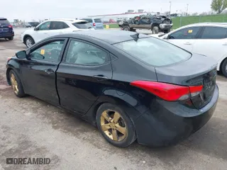 2013 Hyundai Elantra GLS PZEV with VIN 5NPDH4AE7DH343411, listed as a IAAI auction lot 41931384 with 112,000 mi miles. Bid and sale history available at carsss.com. Image 3.