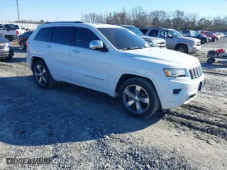 2014 Jeep Grand Cherokee Overland with VIN 1C4RJFCG9EC587322, listed as a IAAI auction lot 41632299 with 161,779 mi miles. Bid and sale history available at carsss.com. Image 1.