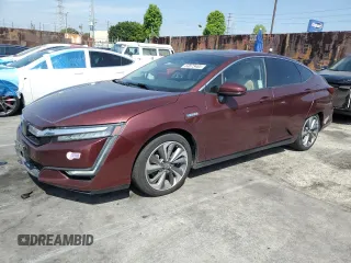 2018 Honda Clarity z VIN JHMZC5F1XJC022498, wystawiony jako Copart lot #53573485 z przebiegiem 81 470 mil mil oraz Szkoda całkowita • Salvage title. Historia ofert i sprzedaży dostępna na DreamBid. Obrazek 1.