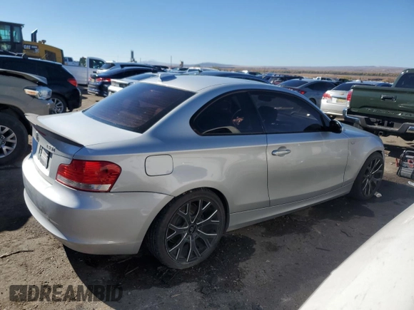 2009 BMW 1 Series 128i with VIN WBAUP93529VF48915, listed as a Copart auction lot 80310034 with 143,208 mi miles and Salvage title. Bid and sale history available at DreamBid. Image 3.
