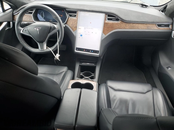 2017 Tesla Model S 100D with VIN 5YJSA1E25HF192230, listed as a Copart auction lot 55298065 with 64,536 mi miles and Salvage Title. Bid and sale history available at DreamBid. Image 8.
