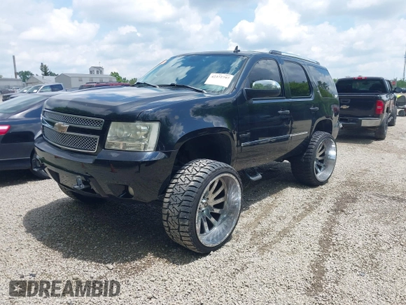 2007 Chevrolet Tahoe LT z VIN 1GNFK13067R331734, wystawiony jako IAAI lot #42372797 z przebiegiem 173 150 mil mil oraz . Historia ofert i sprzedaży dostępna na DreamBid. Obrazek 2.