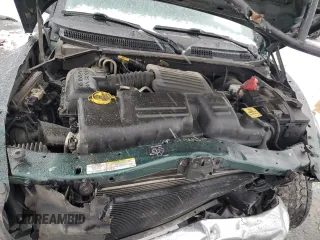 2002 Dodge Dakota SLT с VIN 1B7HG48N12S614309, выставлен на аукционе Copart как лот 87309554 с пробегом 287 994 миль миль и Списание • Salvage title. История ставок и продаж доступна на DreamBid. Изображение 13.
