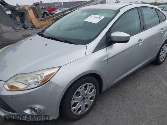 2012 Ford Focus SE with VIN 1FAHP3F27CL257447, listed as a IAAI auction lot 42180626 with 130,155 mi miles. Bid and sale history available at carsss.com. Image 6.