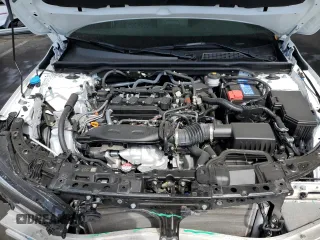 2024 Honda Civic Sport Touring z VIN 19XFL1G85RE012975, wystawiony jako Copart lot #50999015 z przebiegiem 13 552 mil mil oraz Szkoda całkowita • Salvage title. Historia ofert i sprzedaży dostępna na DreamBid. Obrazek 11.