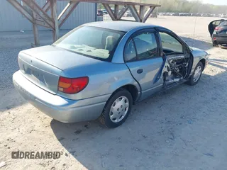 2001 Saturn SL z VIN 1G8ZH528X1Z330896, wystawiony jako IAAI lot #42104170 z przebiegiem 136 290 mil mil oraz . Historia ofert i sprzedaży dostępna na DreamBid. Obrazek 4.
